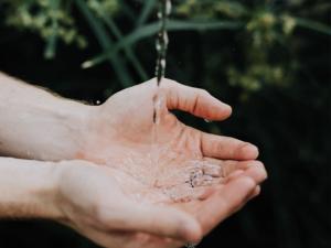 Water running into hands